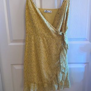 Never worn Hollister yellow wrap dress
